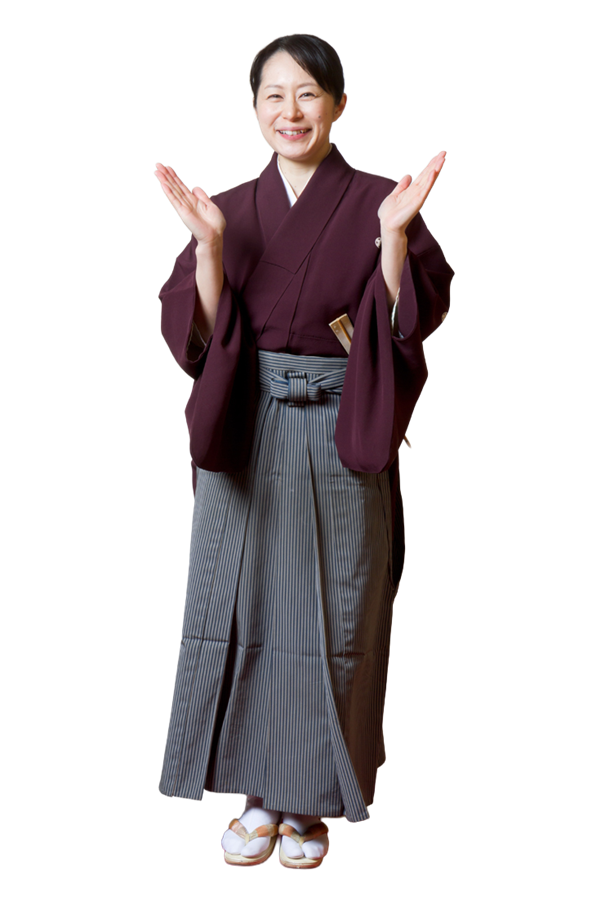 A professional female Noh performer in traditional attire
