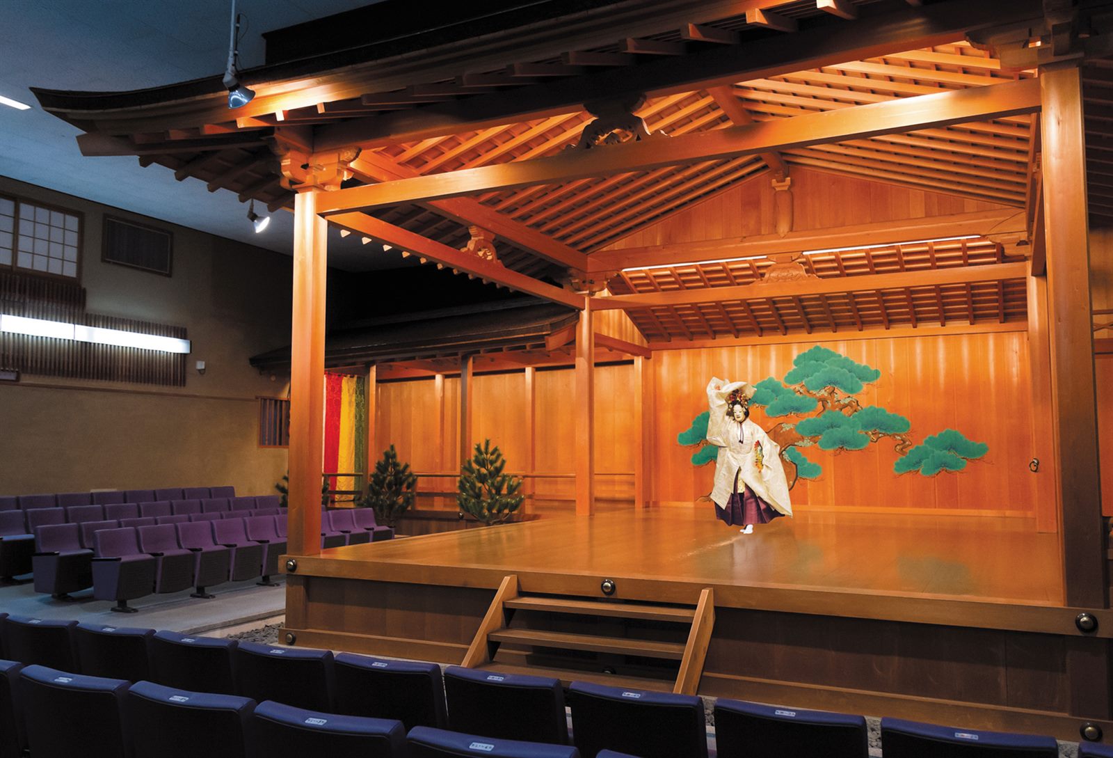 Full view of the Noh stage at Kitaryu Oshima Noh Theatre during a performance